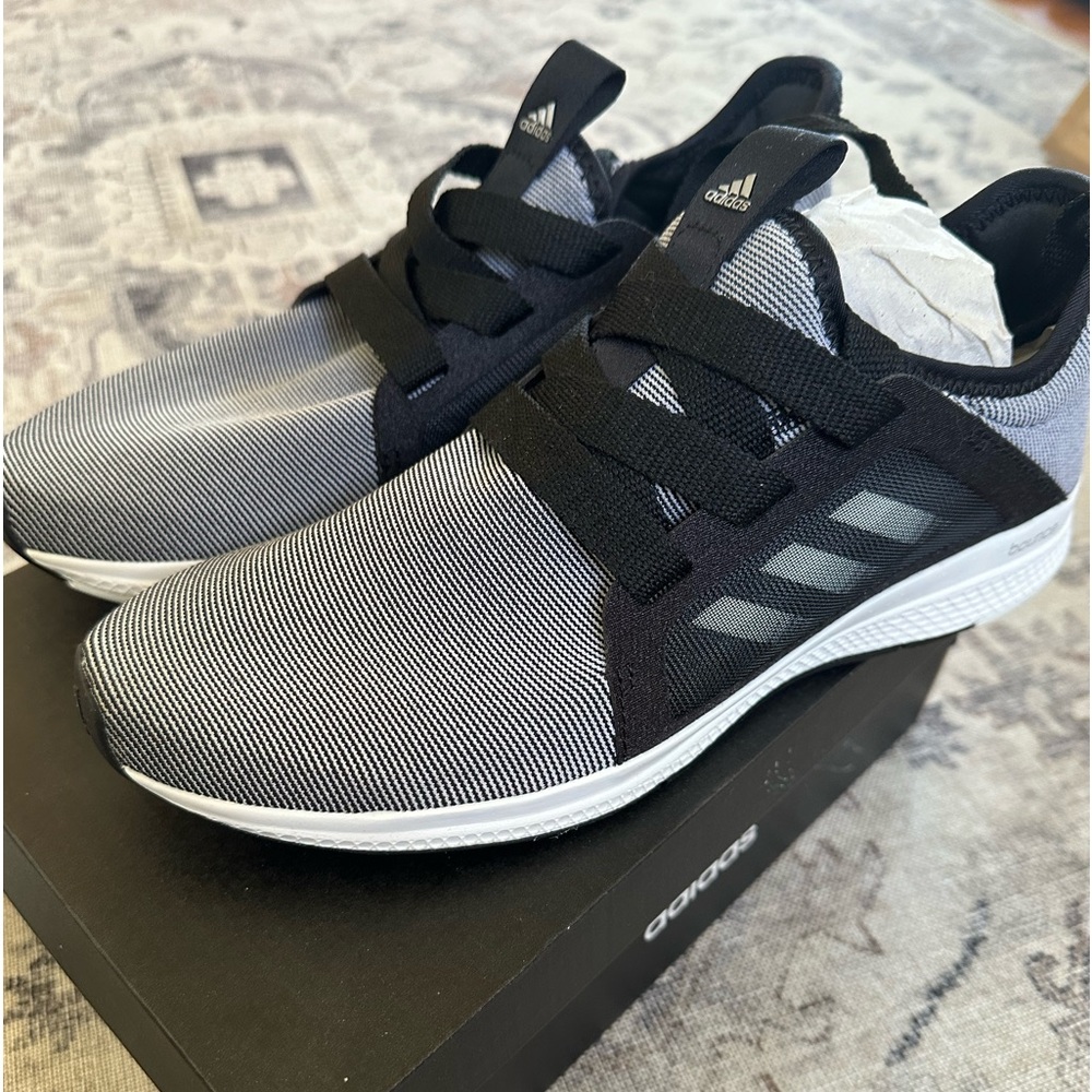 Adidas brand, never worn! Women’s size 8.5.